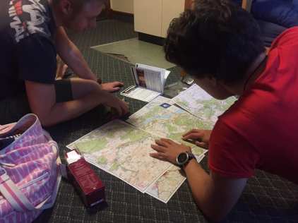 Poring over the maps before the start